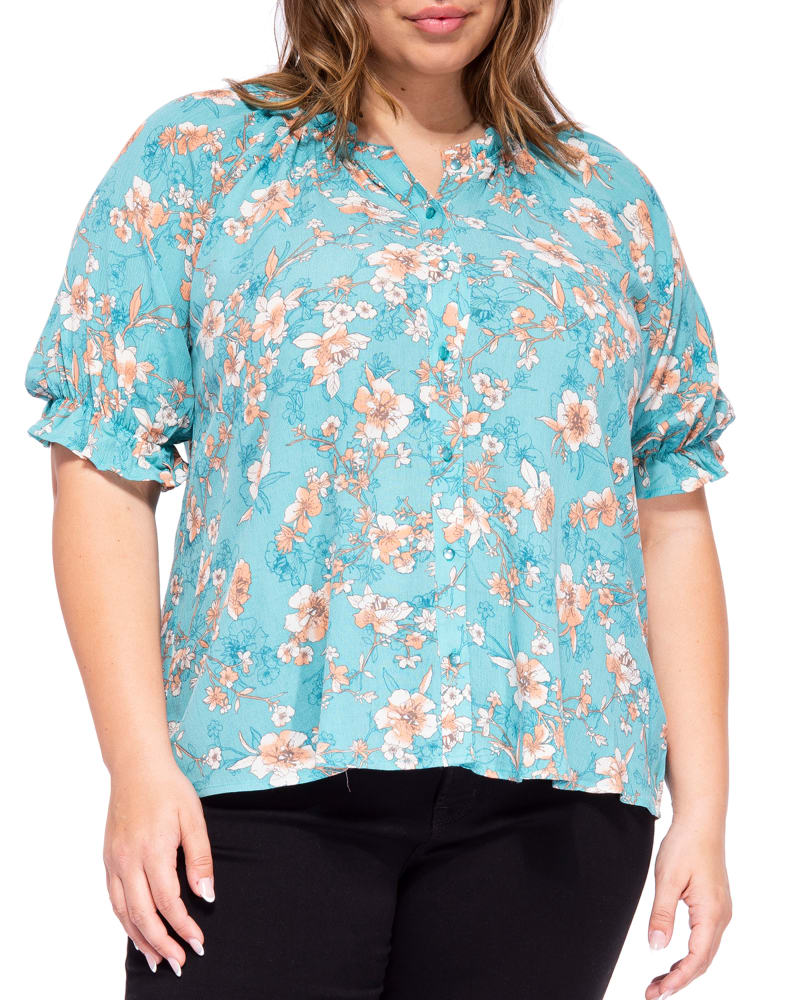 Plus size model wearing Leah Button Down Ruffle Blouse by B COLLECTION BY BOBEAU CURVY | Dia&Co | dia_product_style_image_id:190882